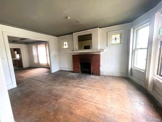 2471-2473 Lothrop St, Detroit, MI 48206 - unfurnished living room featuring a fireplace