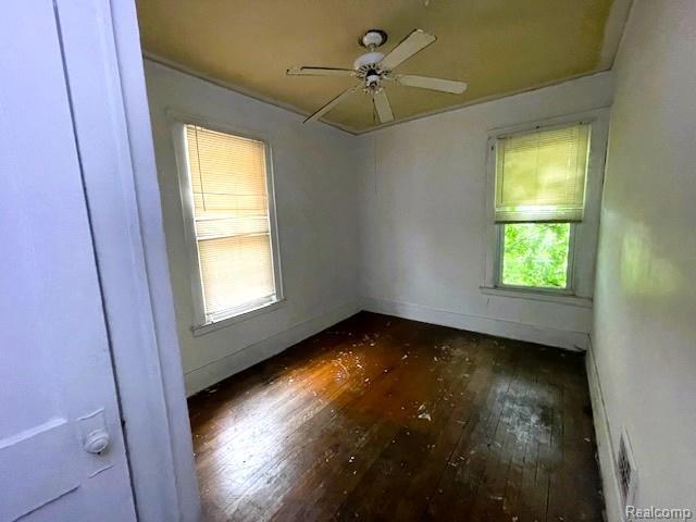 2471-2473 Lothrop St, Detroit, MI 48206 - unfurnished room featuring hardwood / wood-style floors and a ceiling fan