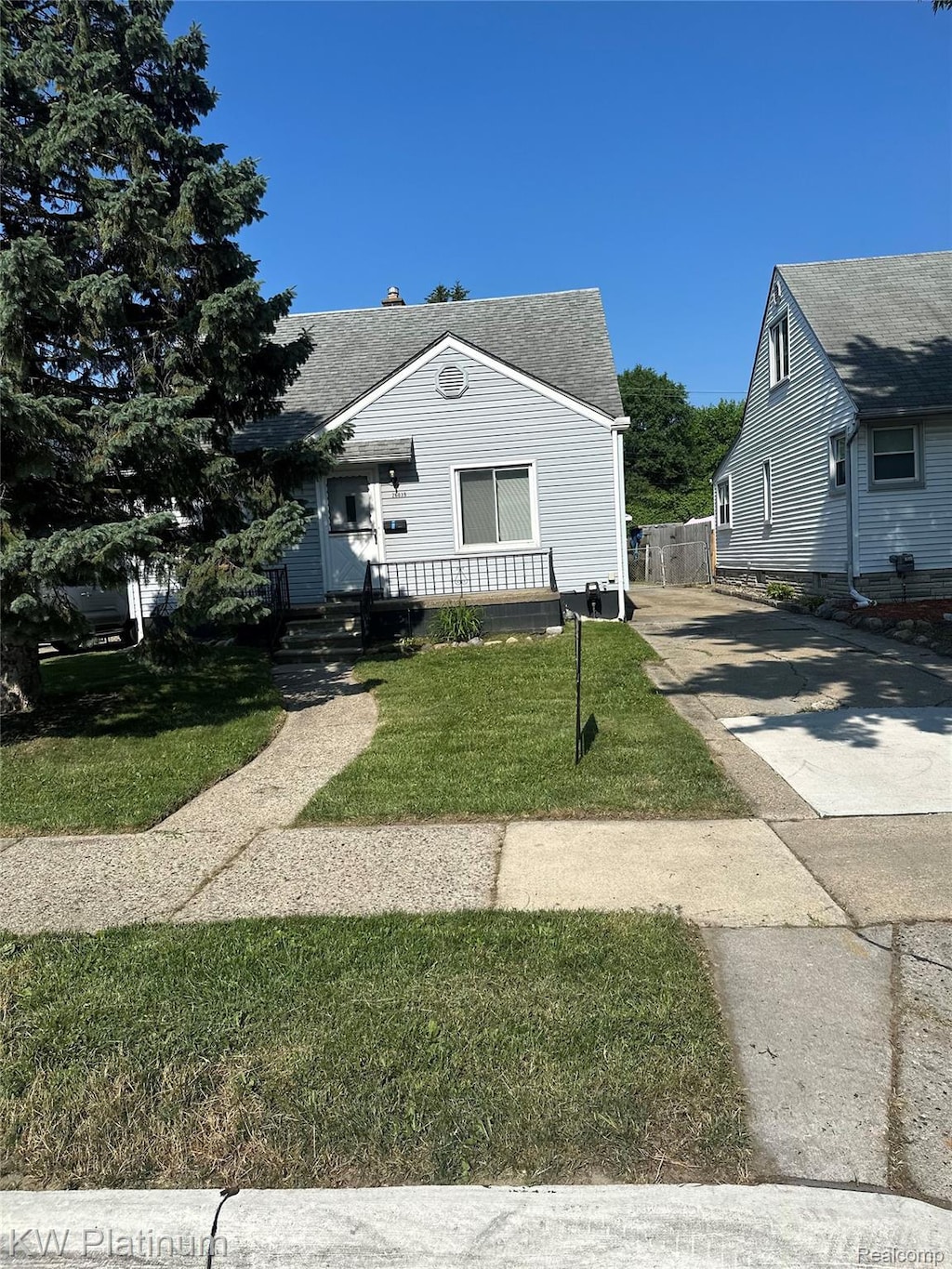 26039 Pattow St, Roseville, MI 48066 - bungalow with driveway and a shingled roof