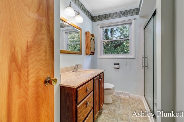 1460 N Peterson Rd, Muskegon, MI 49445 - bathroom with vanity, a shower stall, and stone finish flooring