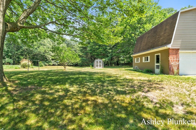 1460 N Peterson Rd, Muskegon, MI 49445 - view of grassy yard with a garage and a storage shed