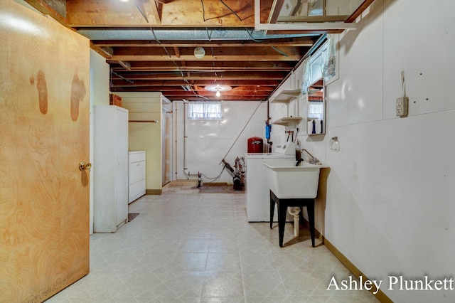 1460 N Peterson Rd, Muskegon, MI 49445 - basement featuring washing machine and clothes dryer