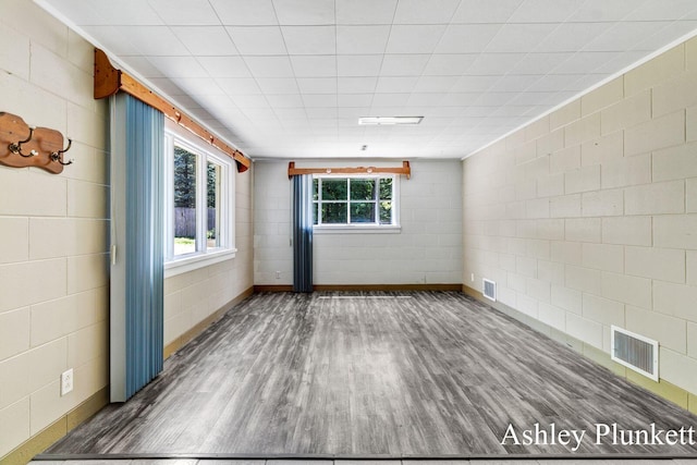 1460 N Peterson Rd, Muskegon, MI 49445 - empty room with wood finished floors and baseboards
