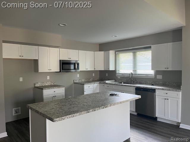 9351 Rayna Dr, Davison, MI 48423 - kitchen featuring stainless steel appliances, white cabinetry, and recessed lighting