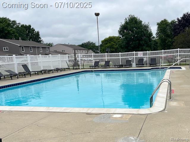 9351 Rayna Dr, Davison, MI 48423 - community pool with a patio area