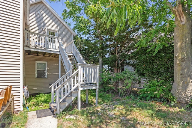 1002 Madison St, Grand Haven, MI 49417 - view of yard with stairway and a deck