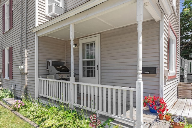 1002 Madison St, Grand Haven, MI 49417 - doorway to property featuring cooling unit