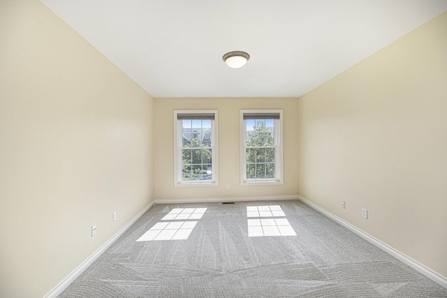 5724 Hampshire Ln, Ypsilanti, MI 48197 - carpeted spare room featuring baseboards