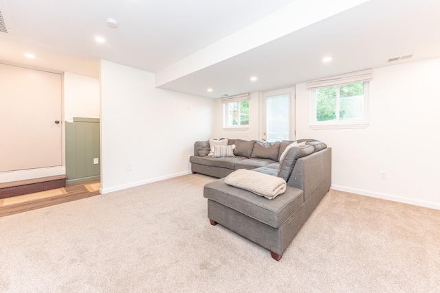 4893 Club Pl, Ypsilanti, MI 48197 - living room with light colored carpet, recessed lighting, and healthy amount of natural light
