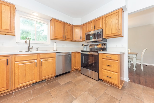 4893 Club Pl, Ypsilanti, MI 48197 - kitchen featuring appliances with stainless steel finishes and light countertops
