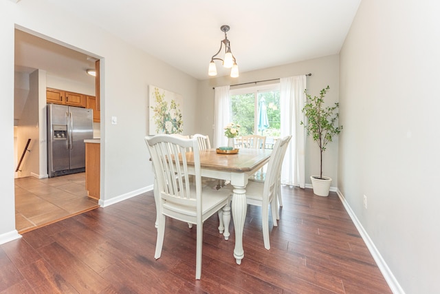4893 Club Pl, Ypsilanti, MI 48197 - dining space with wood finished floors and a chandelier