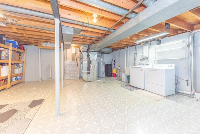 4893 Club Pl, Ypsilanti, MI 48197 - unfinished below grade area featuring water heater, light flooring, separate washer and dryer, stairway, and heating unit