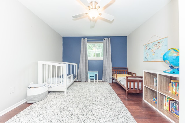 4893 Club Pl, Ypsilanti, MI 48197 - bedroom featuring dark wood-type flooring and baseboards