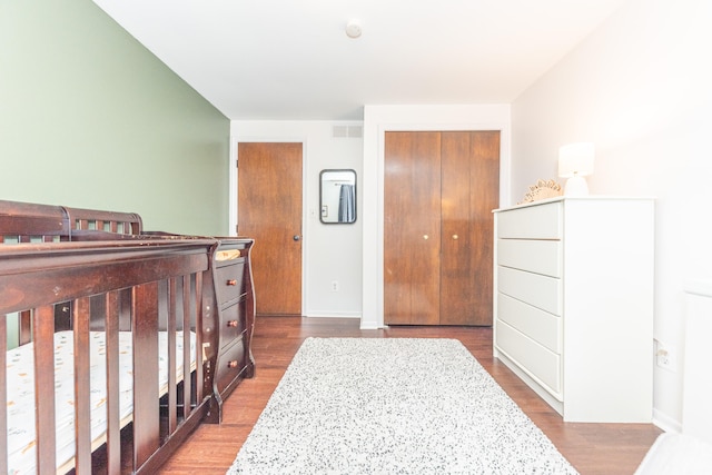 4893 Club Pl, Ypsilanti, MI 48197 - bedroom featuring wood finished floors and a closet