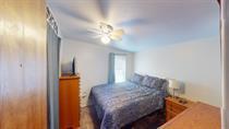 101 E Mckay St, Saline, MI 48176 - bedroom with a ceiling fan