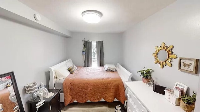 101 E Mckay St, Saline, MI 48176 - bedroom featuring light wood-style flooring