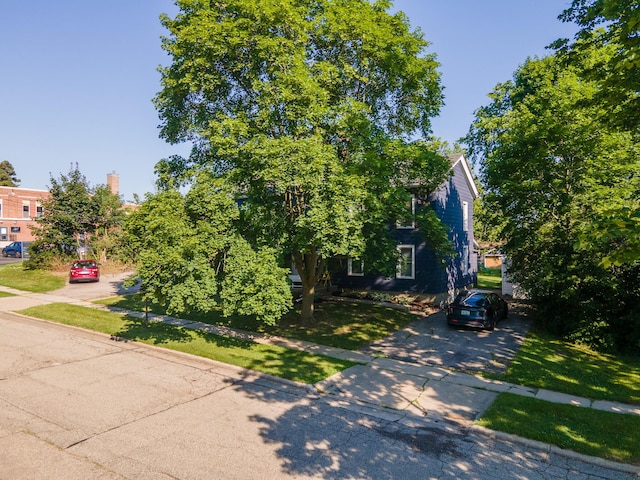 101 E Mckay St, Saline, MI 48176 - obstructed view of property with driveway