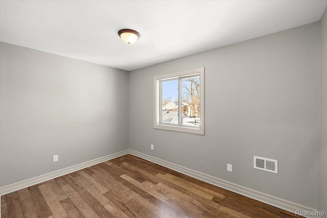 20817 Parkside Blvd, Ferndale, MI 48220 - unfurnished room featuring dark wood-type flooring and baseboards