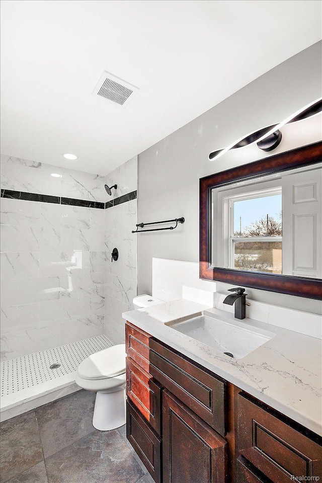 20817 Parkside Blvd, Ferndale, MI 48220 - full bathroom featuring vanity and a marble finish shower