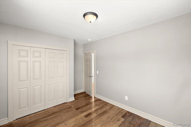 20817 Parkside Blvd, Ferndale, MI 48220 - unfurnished bedroom featuring wood finished floors and a closet
