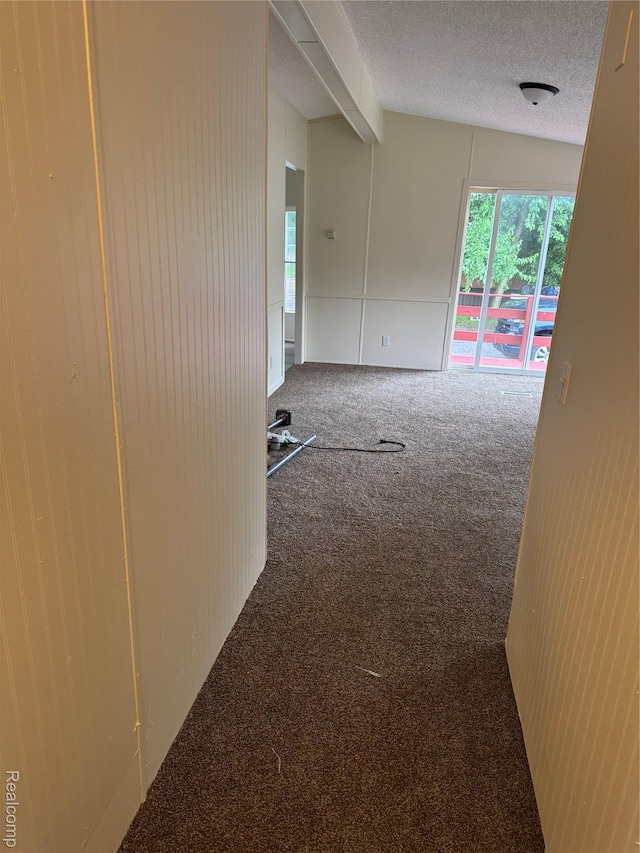 2445 E Grand River Ave, Lot, Williamston, MI 48895 - hall featuring carpet floors and a textured ceiling