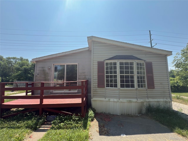 2445 E Grand River Ave, Lot, Williamston, MI 48895 - view of front of home featuring a deck