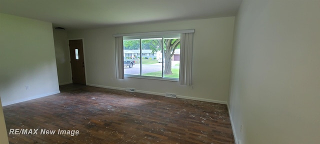 4404 Eastport Dr, Bridgeport, MI 48722 - empty room featuring wood-type flooring and baseboards