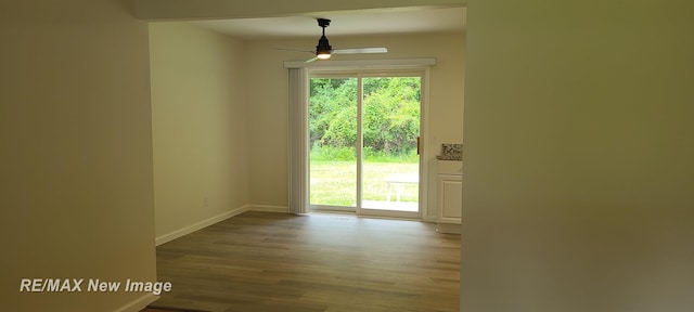 4404 Eastport Dr, Bridgeport, MI 48722 - unfurnished room with ceiling fan and wood finished floors