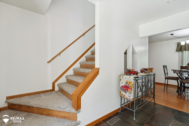 416 State Park Rd, Ortonville, MI 48462 - stairway with baseboards and stone finish flooring