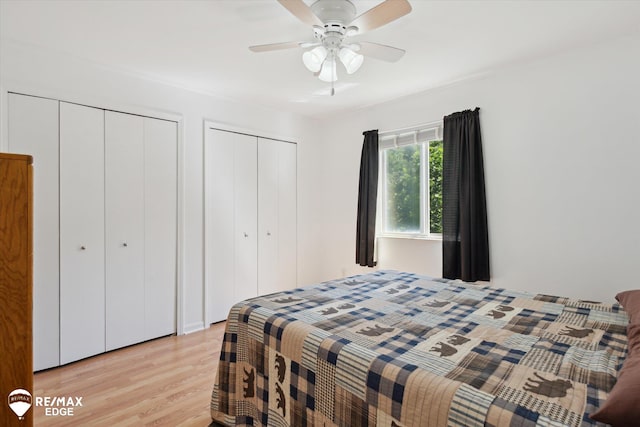 416 State Park Rd, Ortonville, MI 48462 - bedroom with two closets, light wood-style floors, and ceiling fan