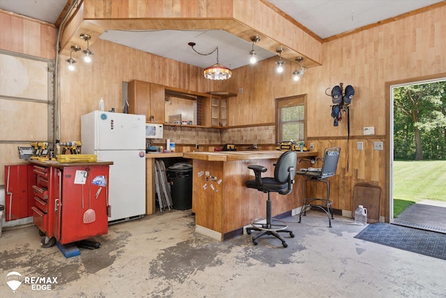 416 State Park Rd, Ortonville, MI 48462 - kitchen featuring white appliances, concrete flooring, wood walls, open shelves, and a peninsula