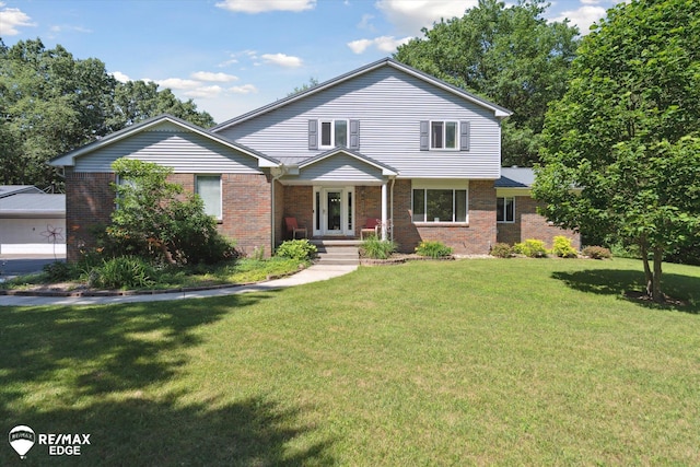 416 State Park Rd, Ortonville, MI 48462 - traditional home featuring brick siding and a front yard