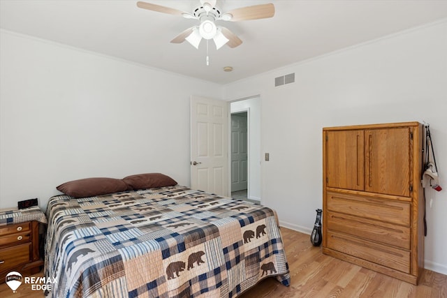 416 State Park Rd, Ortonville, MI 48462 - bedroom with light wood-style floors, ceiling fan, and crown molding