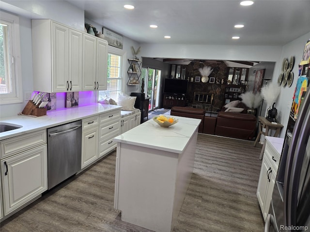17328 Mcnamara Dr, Garden City, MI 48152 - kitchen featuring dishwasher, dark wood-type flooring, a kitchen island, white cabinets, and recessed lighting