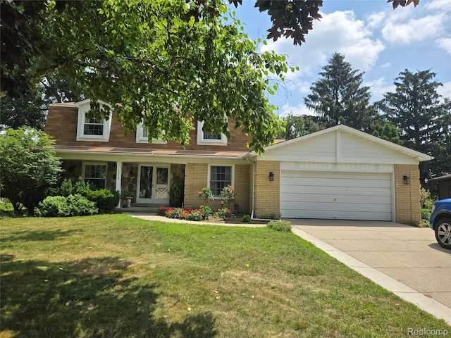 17328 Mcnamara Dr, Garden City, MI 48152 - view of front of house with an attached garage, concrete driveway, brick siding, and a front lawn