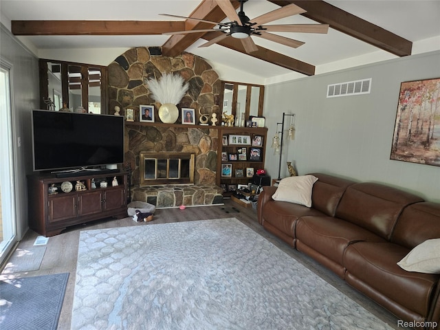 17328 Mcnamara Dr, Garden City, MI 48152 - living room featuring wood finished floors, ceiling fan, and a fireplace