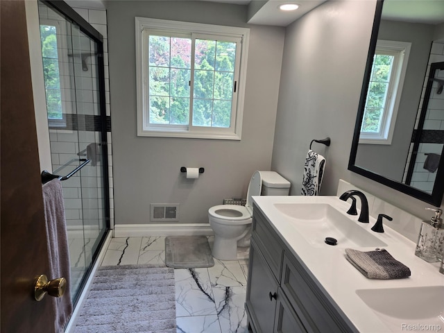 17328 Mcnamara Dr, Garden City, MI 48152 - full bath with marble finish flooring, double vanity, and a shower stall