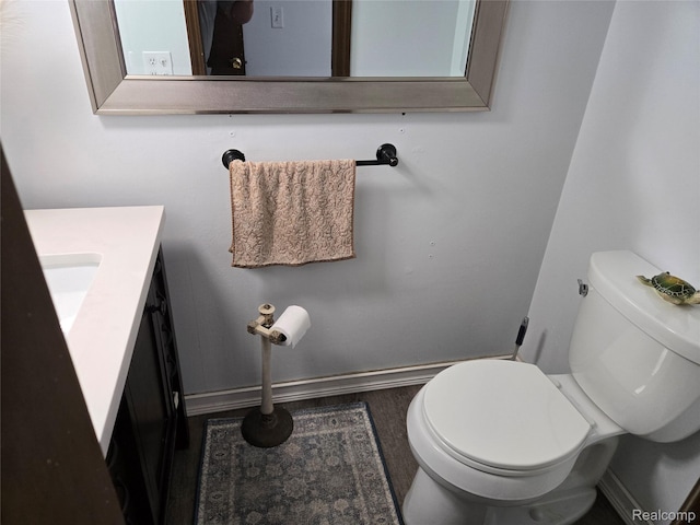 17328 Mcnamara Dr, Garden City, MI 48152 - half bath featuring vanity and wood finished floors