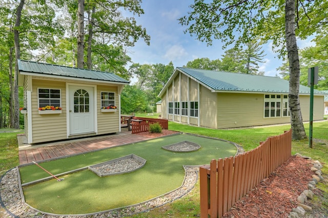 5154 Cherry Rd, Farwell, MI 48622 - view of grassy yard with an outbuilding and a wooden deck