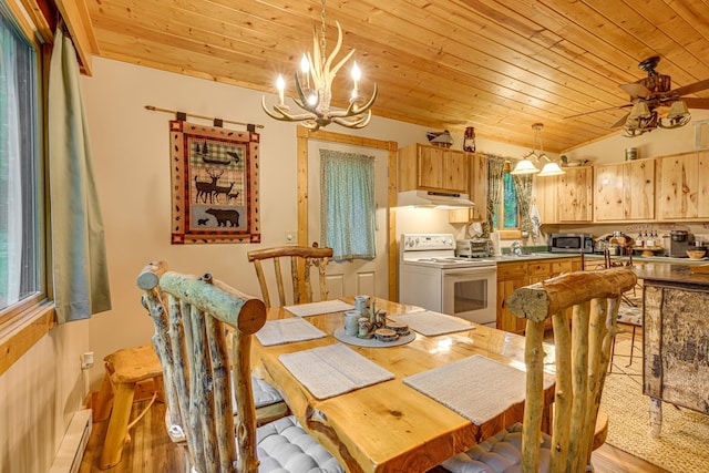 5154 Cherry Rd, Farwell, MI 48622 - dining room featuring a baseboard heating unit, a chandelier, wooden ceiling, wood finished floors, and lofted ceiling