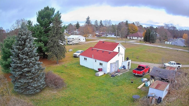 524 S Cherry St, Evart, MI 49631 - aerial perspective of suburban area