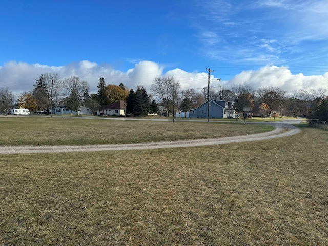 524 S Cherry St, Evart, MI 49631 - view of property's community with a yard