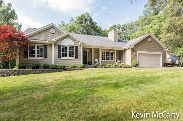 530 Pine Haven Dr, Comstock Park, MI 49321 - ranch-style home with a chimney, a garage, a front yard, and roof with shingles