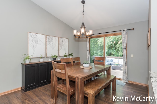 530 Pine Haven Dr, Comstock Park, MI 49321 - dining space with lofted ceiling, a chandelier, and dark wood-style floors