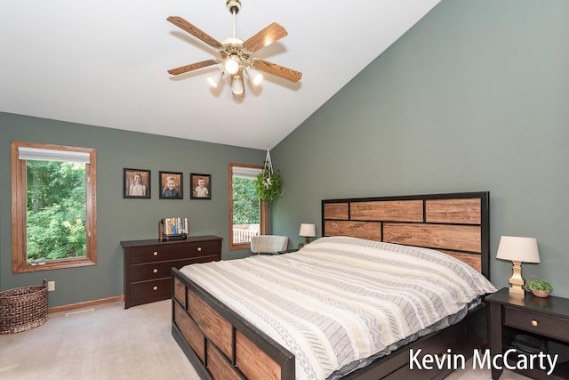 530 Pine Haven Dr, Comstock Park, MI 49321 - bedroom featuring multiple windows, lofted ceiling, light colored carpet, and ceiling fan