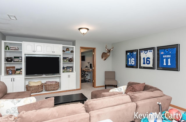 530 Pine Haven Dr, Comstock Park, MI 49321 - carpeted living room featuring baseboards