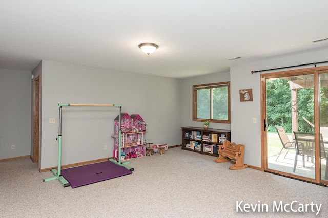 530 Pine Haven Dr, Comstock Park, MI 49321 - rec room with carpet floors and baseboards