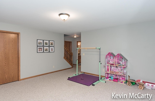 530 Pine Haven Dr, Comstock Park, MI 49321 - playroom featuring carpet floors and baseboards