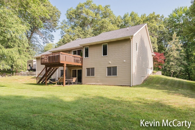 530 Pine Haven Dr, Comstock Park, MI 49321 - back of property with stairs, a deck, and a yard