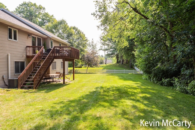 530 Pine Haven Dr, Comstock Park, MI 49321 - view of yard with a wooden deck, stairs, and a patio